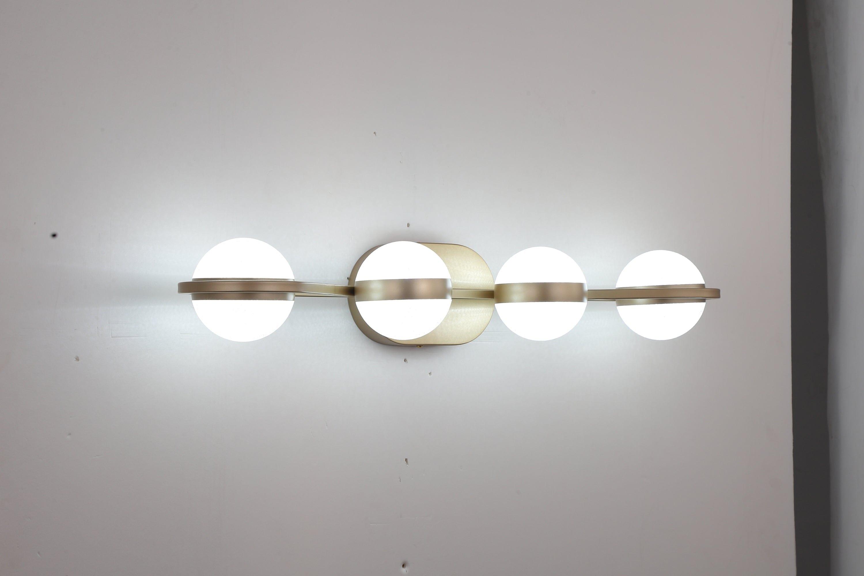 Shop LED Bathroom Vanity Lights Fixtures, 4-Lights Brushed Brass Globe Glass Shade Over Mirror Mademoiselle Home Decor