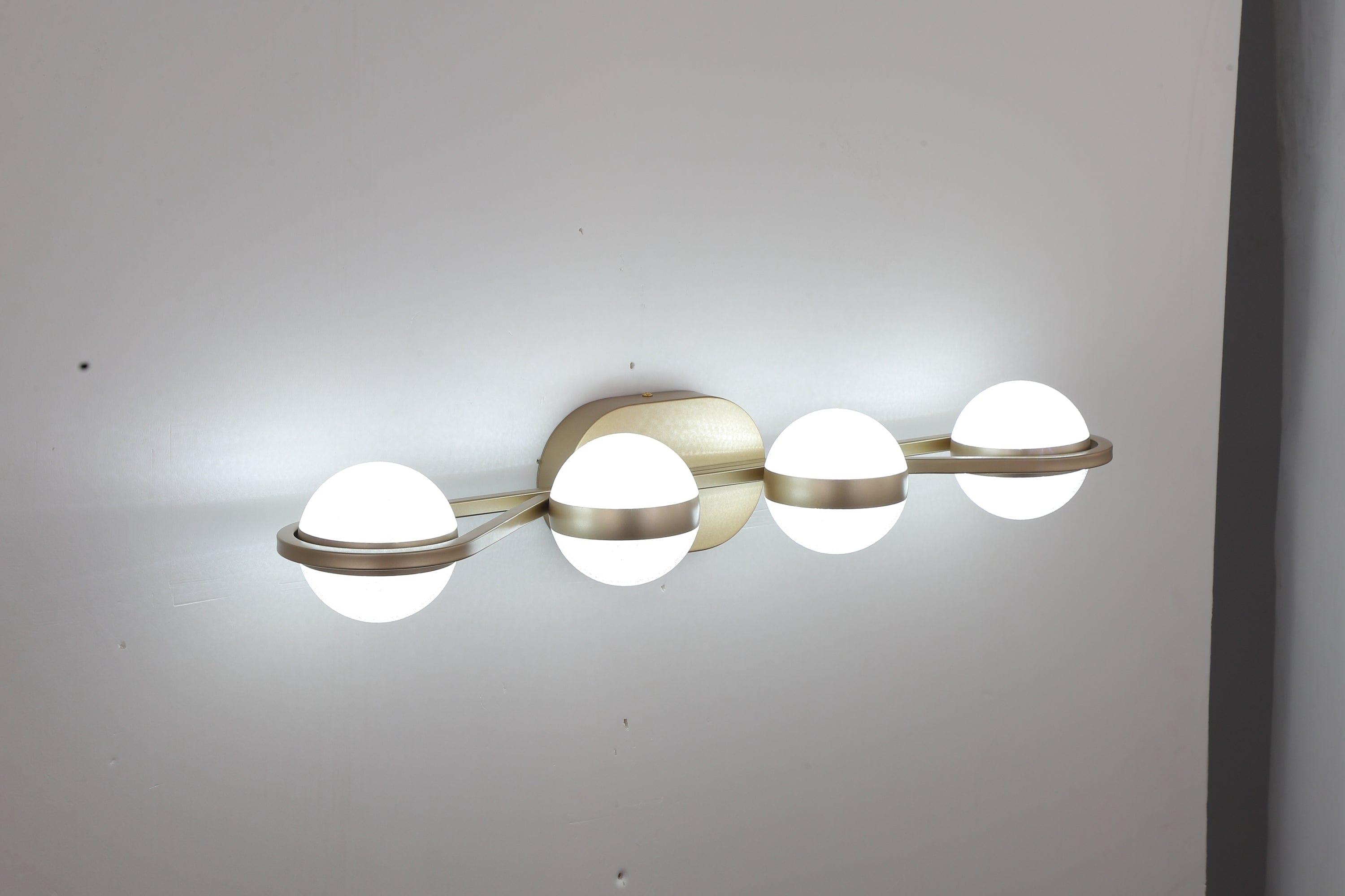 Shop LED Bathroom Vanity Lights Fixtures, 4-Lights Brushed Brass Globe Glass Shade Over Mirror Mademoiselle Home Decor