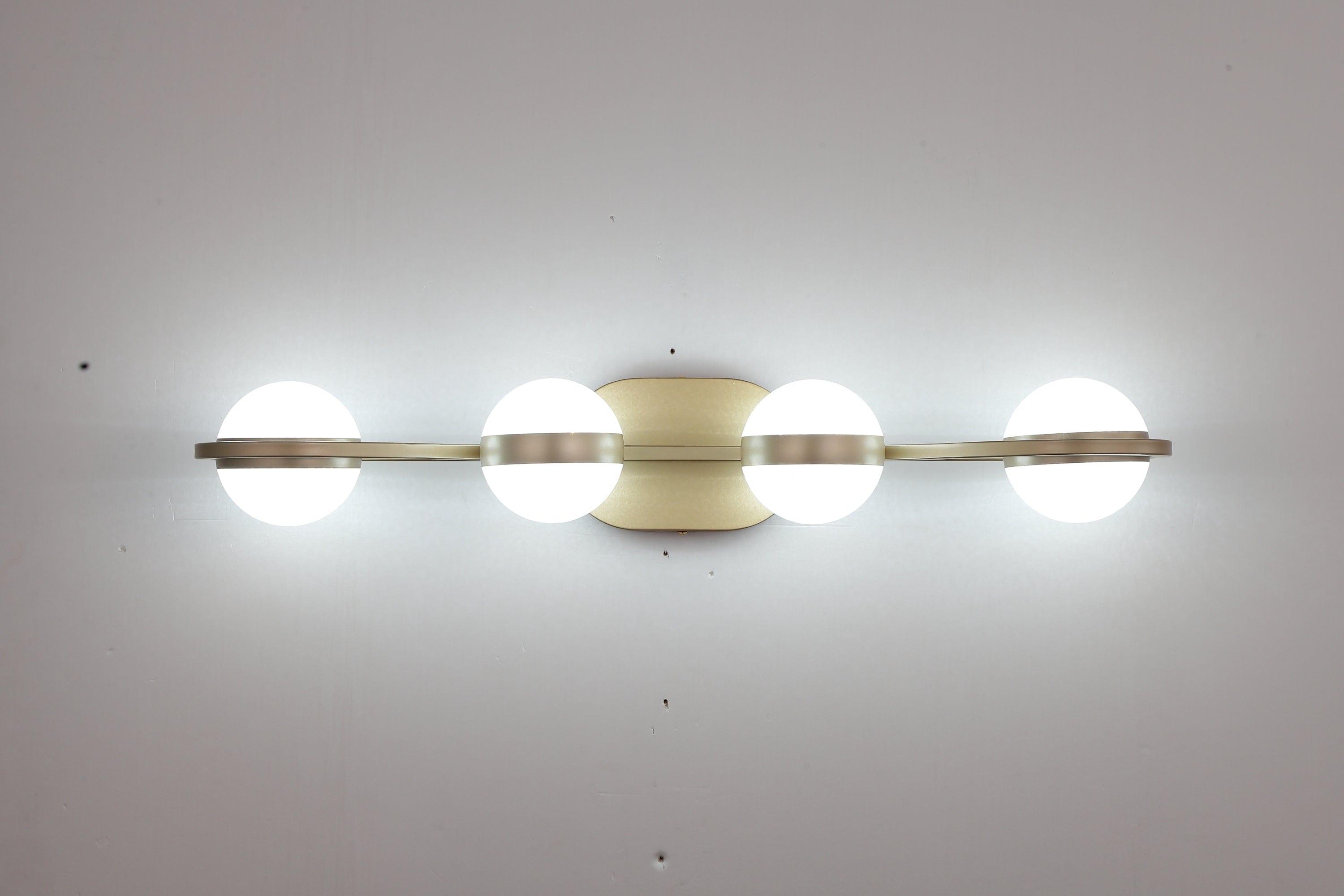 Shop LED Bathroom Vanity Lights Fixtures, 4-Lights Brushed Brass Globe Glass Shade Over Mirror Mademoiselle Home Decor